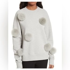 Tibi grey sweatshirt with fur pom poms